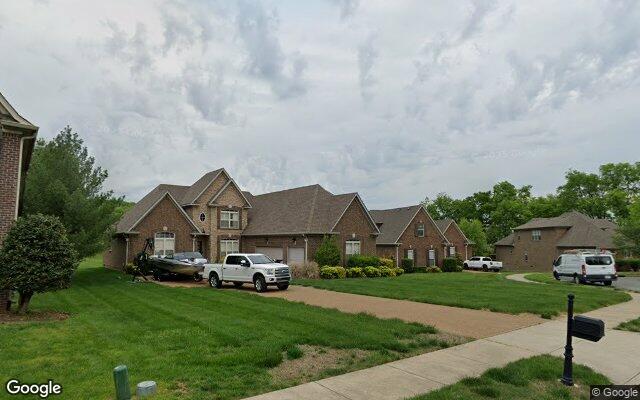 Brick homes along the entrance street.
